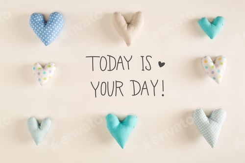 Preview: Today Is Your Day Message With Blue Heart Cushions On A White Paper Background