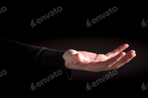 Preview: Man Holding His Hand Out And Showing Something