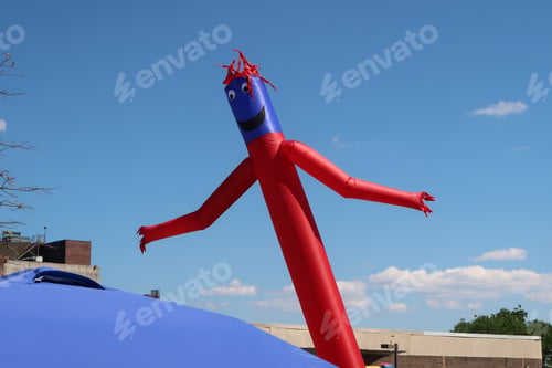 Preview: Inflatable Air Dancer Balloon Man On A Beautiful Summer Afternoon.
