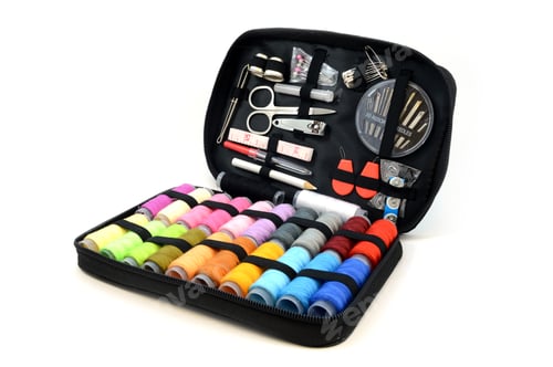 Preview: An Isolated Sewing Kit Used For Repairing Fabrics In Need Of Stitch Work.