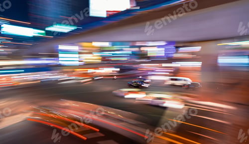 Preview: Abstract Blurred View Of People And Traffic Crossing A Busy Intersection In Shibuya, Tokyo, Japan
