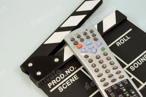 Preview: A Closeup View Of A Remote Control And Directors Clapboard For The Entertainment Industry.