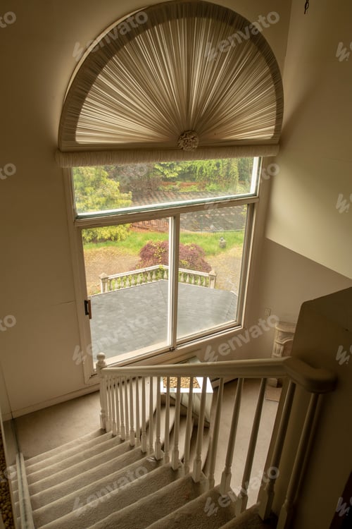 Preview: Stairs In A Clean Abandoned Home. Natural Light. High Angle.