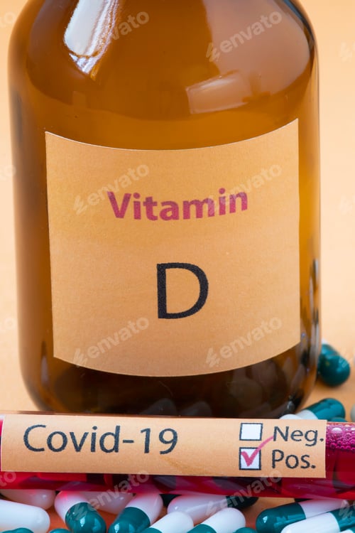 Preview: Vitamin D Container With Capsules Around It And A Vacuum Tube With The Text Covid-19
