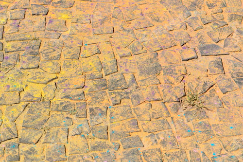 Preview: Abstract Background Of Colored Powder On The Floor.
