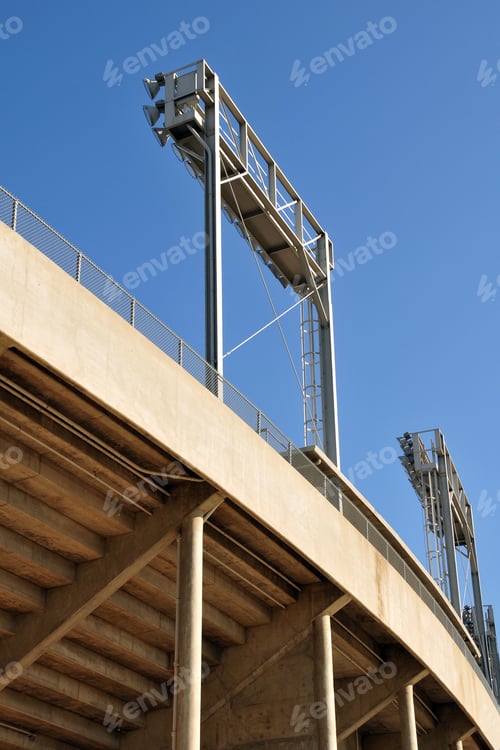 Preview: Banks Of Floodlights Supported On Steel Frames, College Football Stadium