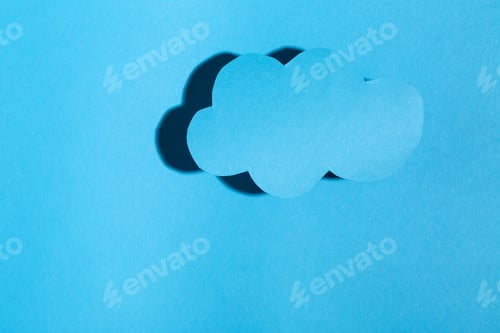 Preview: Paper Cloud With Hard Shadow On A Blue Background