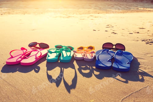 Preview: Colorful Sandals On The Sand At The Beach