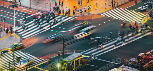 Preview: Traffic Crosses A Busy Intersection In Shibuya, Tokyo, Japan