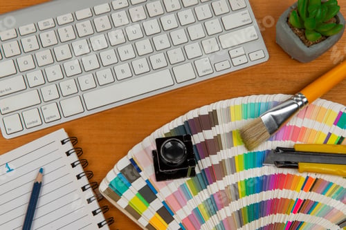 Preview: Color Scale With Stylus And Magnifying Glass On It And A Notebook And Keyboard To Form An Element