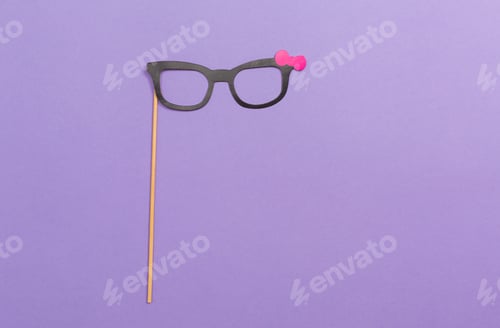 Preview: Party Sticks Accessories On A Purple Paper Background