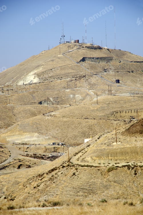 Preview: California Oil Field Showing Steam And Hot Water Lines And Telemetry At Top Of Hill