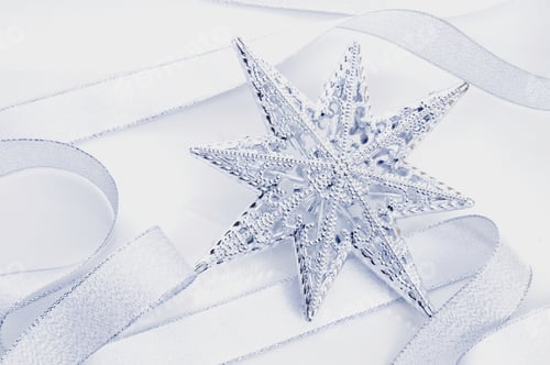 Preview: A White Star And White Ribbon On A White Surface.