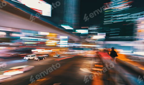 Preview: Abstract Blurred View Of People And Traffic Crossing A Busy Intersection In Shibuya, Tokyo, Japan