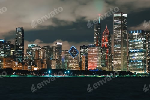 Preview: Downtown Chicago Cityscape Skyline At Night With Lake Michigan In The Foreground
