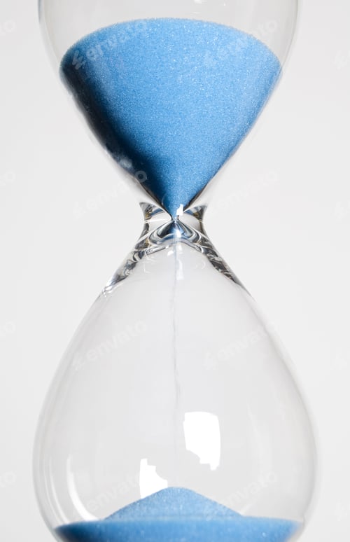 Preview: Sand Flowing To The Bottom Of An Hourglass.