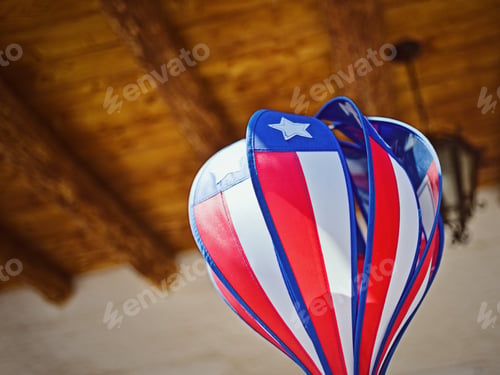 Preview: A Red White And Blue Striped Hot Air Balloon.
