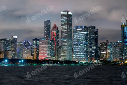 Preview: Chicago Skyline Skyscrapers At Night With Lake Michigan In The Foreground