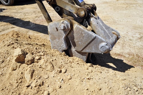 Preview: The Business End Of Power Equipment Used For Excavating And Trenching On Construction Job Sites