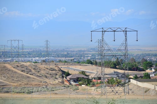 Preview: High Voltage Transmission Lines Occupy The Utility Company'S Right-Of-Way Leading Into The City.