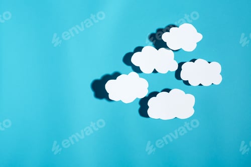 Preview: Paper Cloud With Hard Shadow On A Blue Background