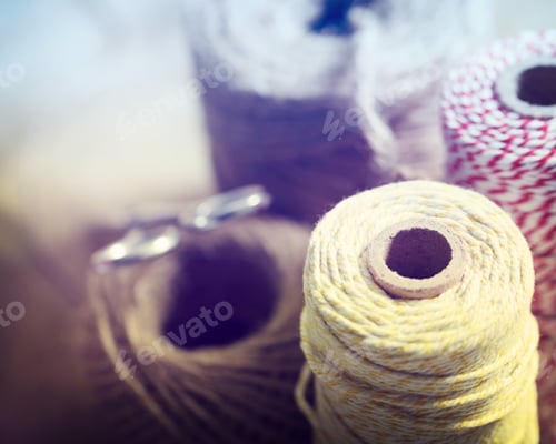 Preview: Spools Of Different Color String With Scissors