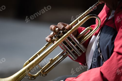 Preview: Closeup Of The Hand Of A Trumpet Playing Busker In Mexico