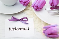 Preview: Welcome Message with Flowers and Place Setting