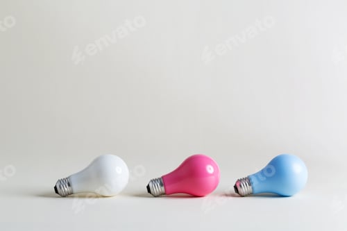 Preview: Colored Light Bulbs On An Off White Background