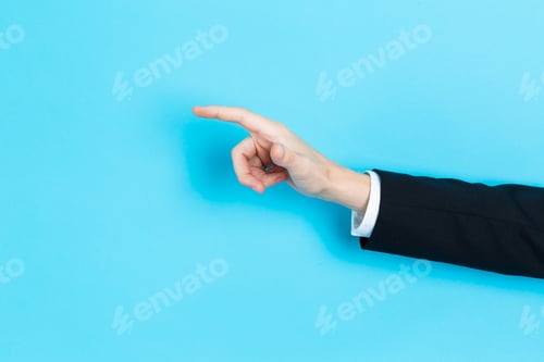 Preview: Businessman Pointing His Finger On A Blue Background