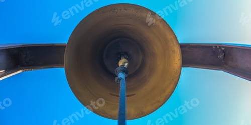 Preview: Bronze Bell With Blue Rope Beneath Blue Sky