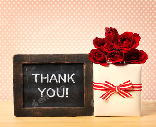 Preview: Thank You Message Written On Little Chalkboard With Roses And Present Box