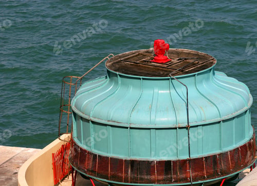 Preview: Industrial Blue And Red Turbine On A Shipping Dock
