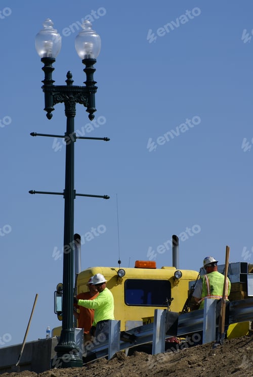 Preview: Workmen Erect Light Standard And Install Guard Rails On Bridge