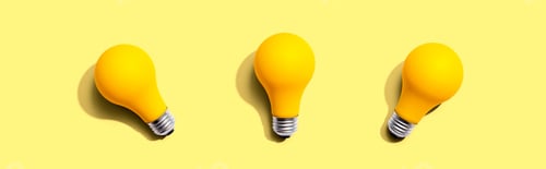 Preview: Three Yellow Light Bulbs - Flat Lay From Above