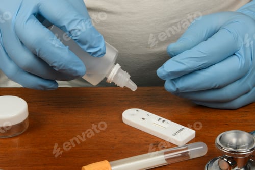 Preview: Doctor Making A Test Kit For Viral Disease Covid-19 Ncov. Laboratory For Coronavirus. Covid-19