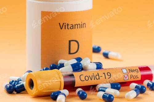 Preview: Vitamin D Container With Capsules Around It And A Vacuum Tube With The Text Covid-19