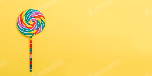 Preview: Big Lollipop On A Yellow Paper Background
