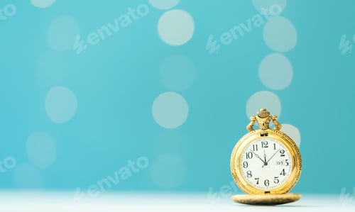 Preview: Old Fashion Pocket Watch On A Shiny Light Blue Background