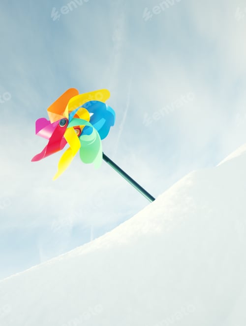 Preview: A Plastic Windmill Sitting In A Pile Of Crisp Snow.
