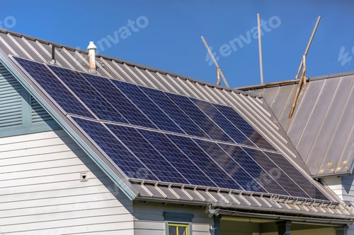 Preview: Solar Panels On Rooftop On A Sunny Day