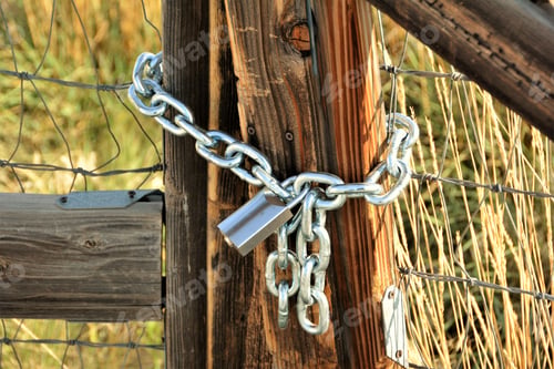 Preview: Old Wooden Fence Locked With New Lock.