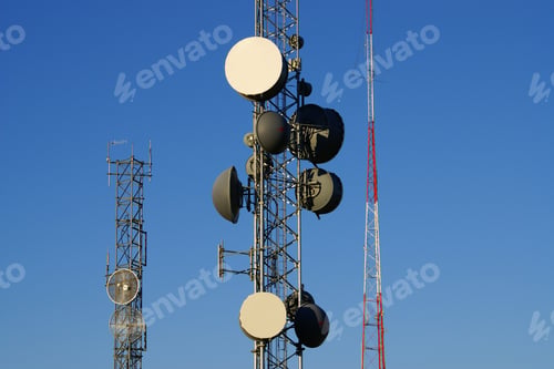 Preview: Antenna Towers Against A Blue Sky