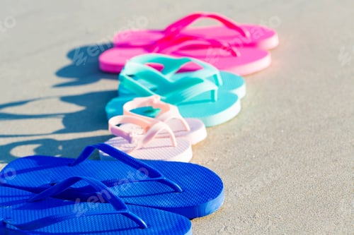 Preview: Colorful Sandals On The Sand At The Beach