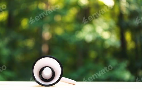Preview: A Megaphone On A Shiny Green Forest Background