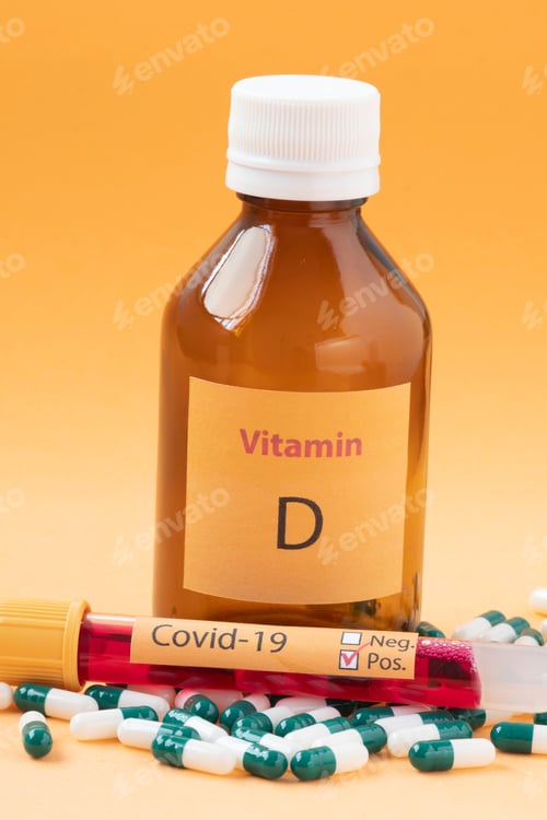 Preview: Vitamin D Container With Capsules Around It And A Vacuum Tube With The Text Covid-19