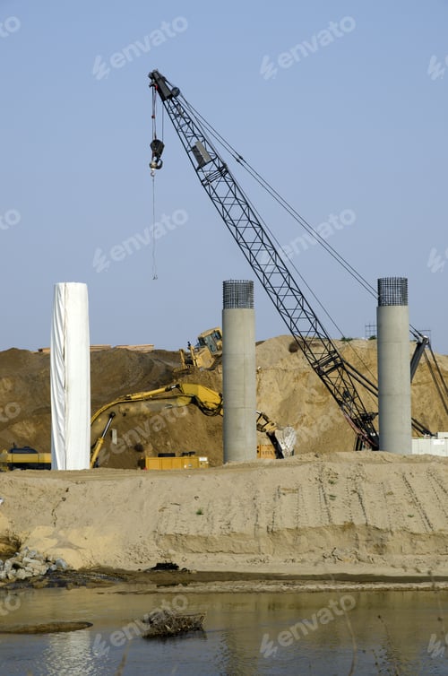 Preview: Bridge Construction Project: Concrete Columns Are Poured In Place. Reinforcing Bars At The Top Will