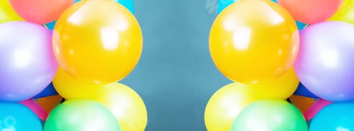 Preview: Yellow, Orange, Green, Blue And Red Balls On A Blue Background.