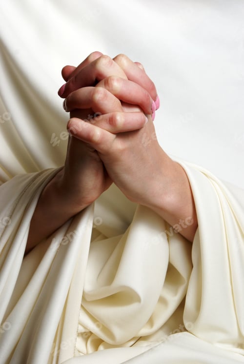 Preview: A Young Woman Faithfully Brings Her Hands Together In Essence Of Prayer.