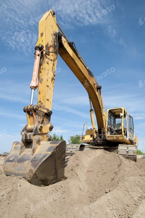 Preview: Heavy Equipment Prepares Construction Job Site: Articulated Boom And Digging Bucket